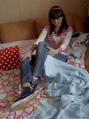 Hot teen takes off her jeans and masturbates