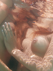 Kaylee and Silvie get hot and wet in the pool