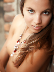 Altea is a smoking hot girl with a coffee flavored skin and petite features all over her nude body.