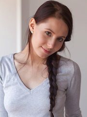 Vanessa Angel shows off her tight, toned body posing naked on the cold steel staircase.