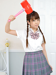 Mizuho Shiraishi Asian with uniform and pigtails plays like child