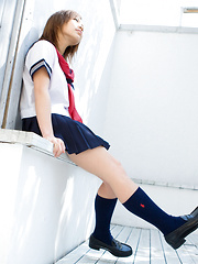 Runa Hamakawa Asian plays with her uniform skirt after classes